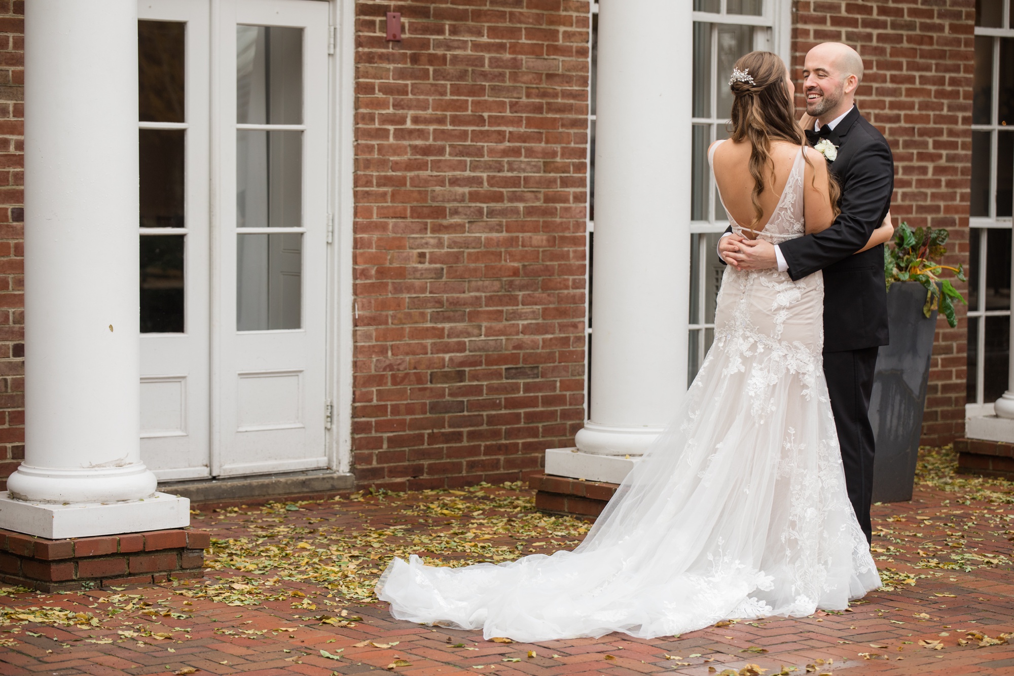 Winter Tidewater inn wedding first look with bride and groom in the courtyard