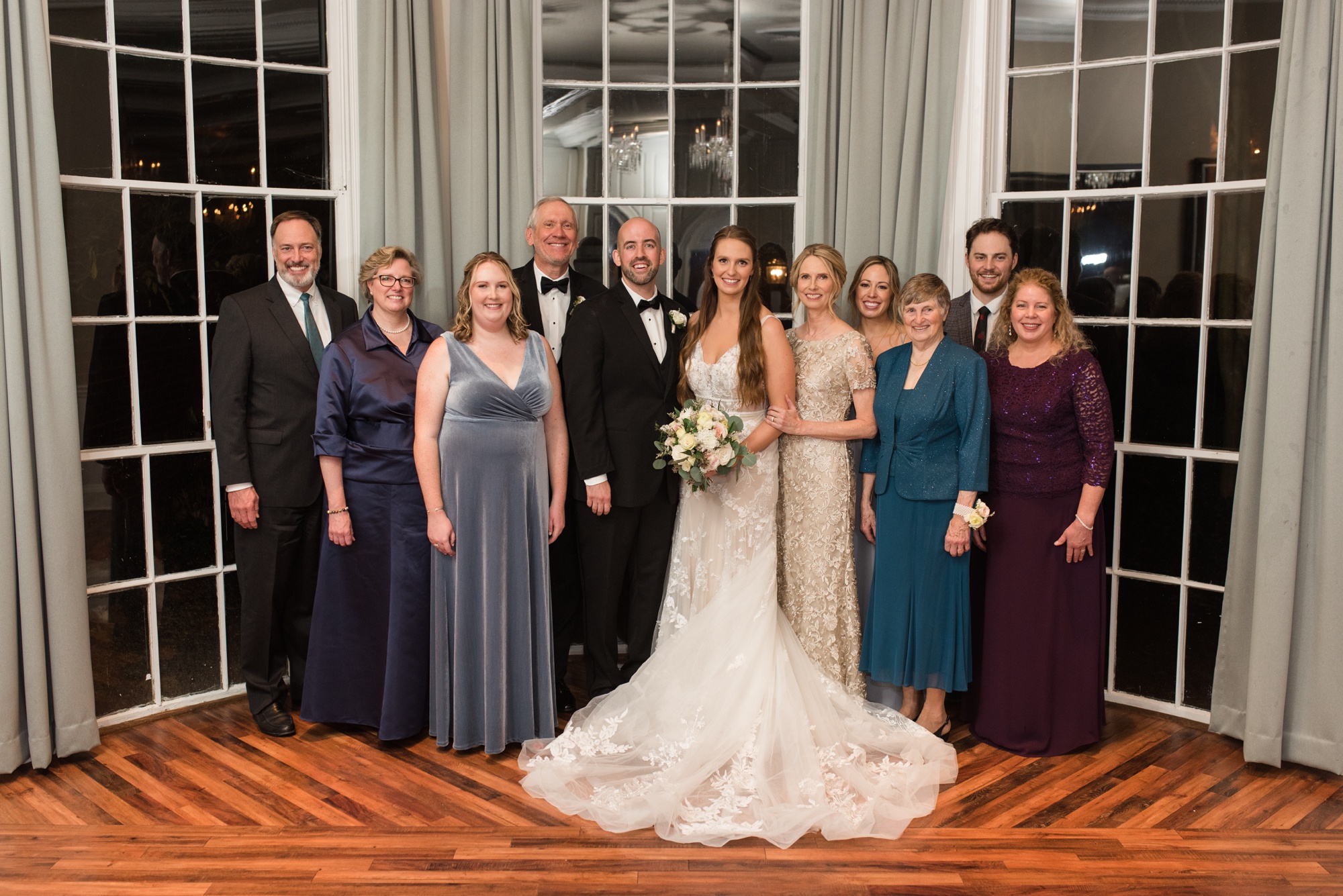 Tidewater inn winter wedding reception crystal room family photo