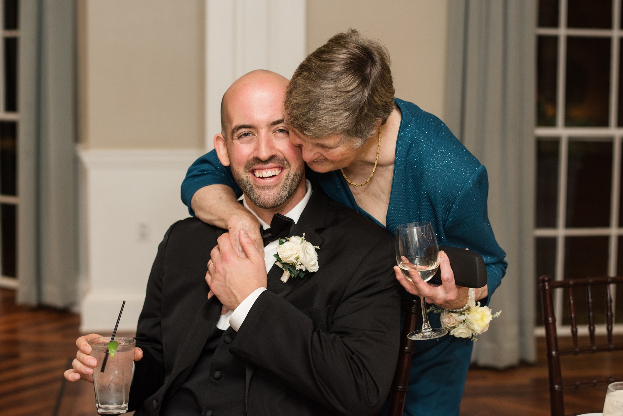 Tidewater inn winter wedding reception crystal room family photo