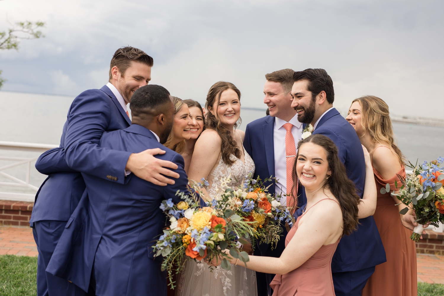 Wedding party overlooking the Chesapeake Bay Beach Club waterfront wedding