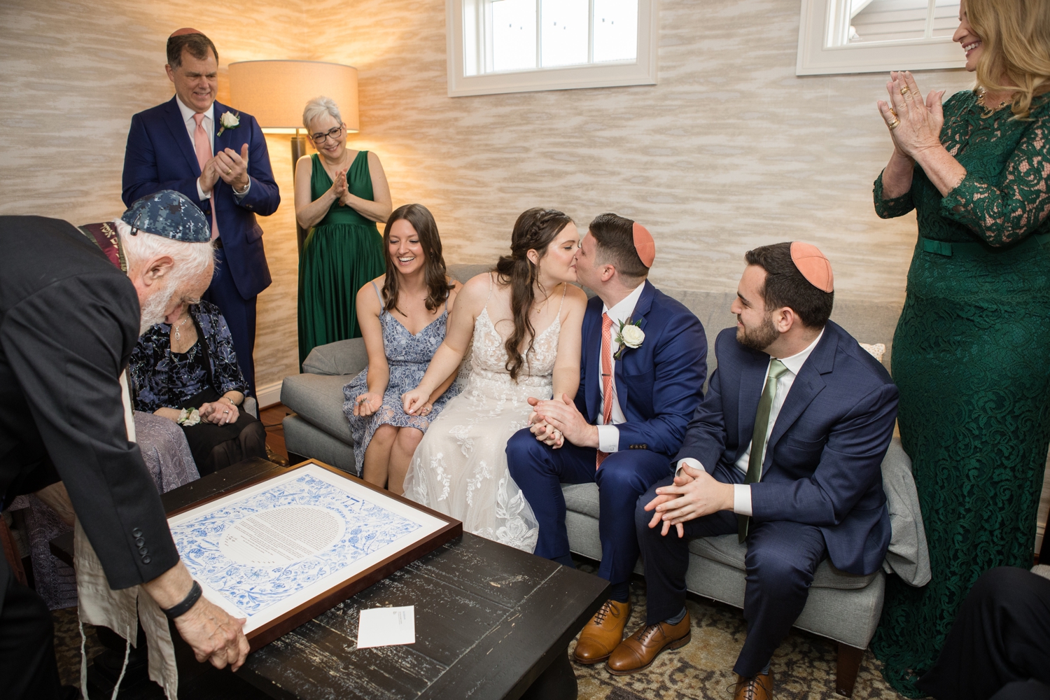 Jewish ceremony signing ketubah at  Chesapeake Bay Beach Club waterfront wedding