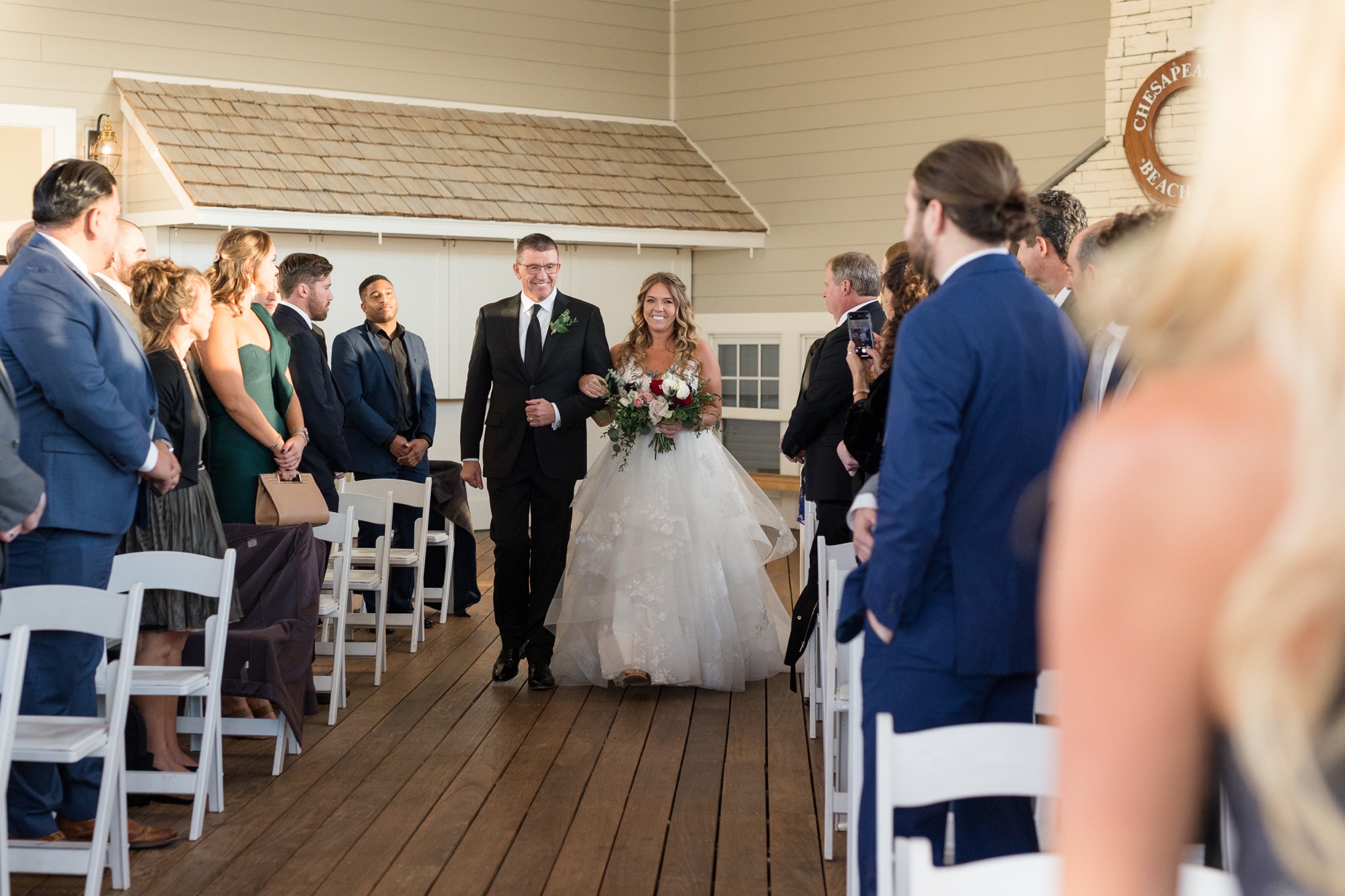 Chesapeake Bay Beach Club wedding ceremony in sunset ballroom