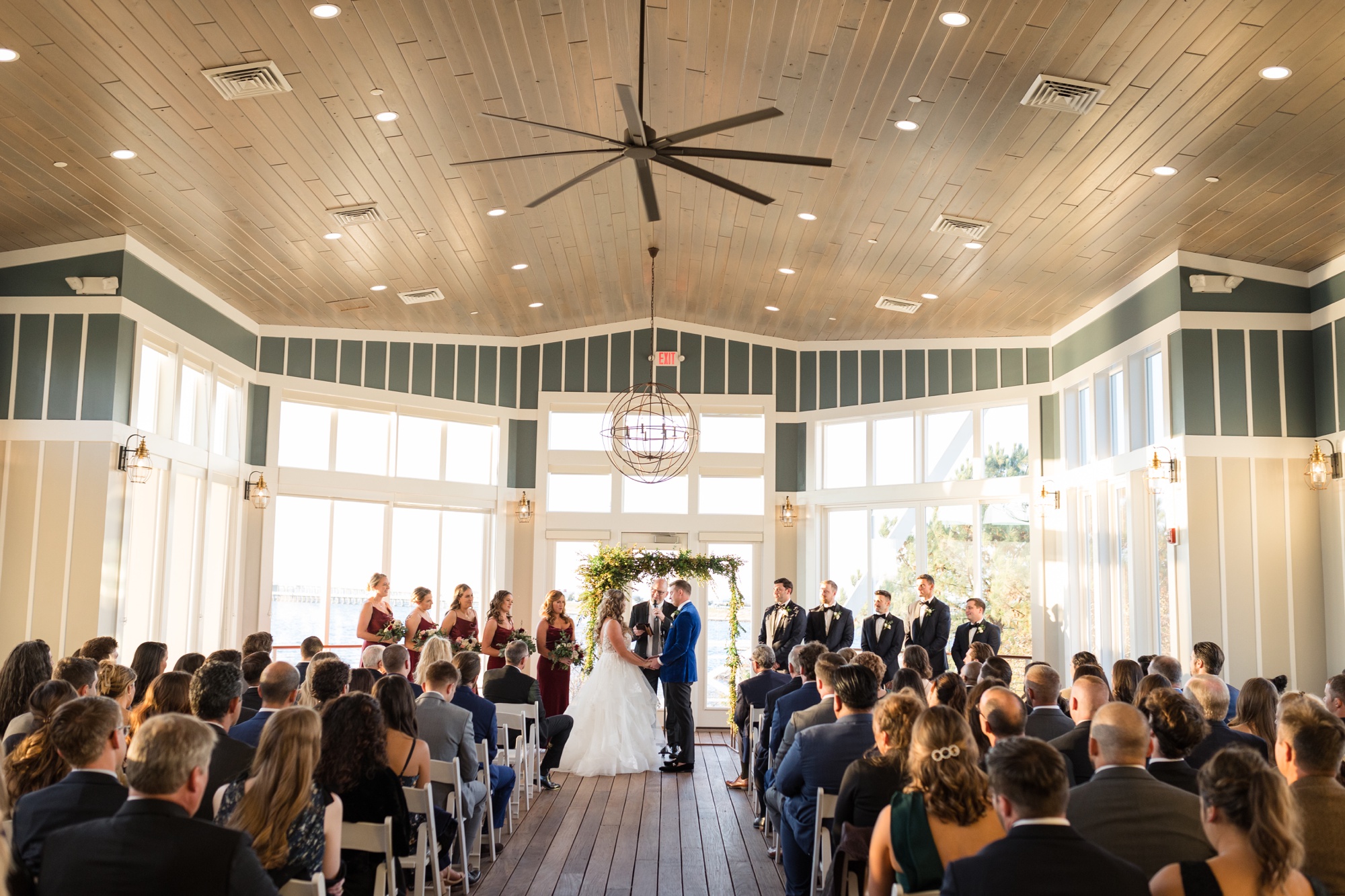 Chesapeake Bay Beach Club wedding ceremony in sunset ballroom