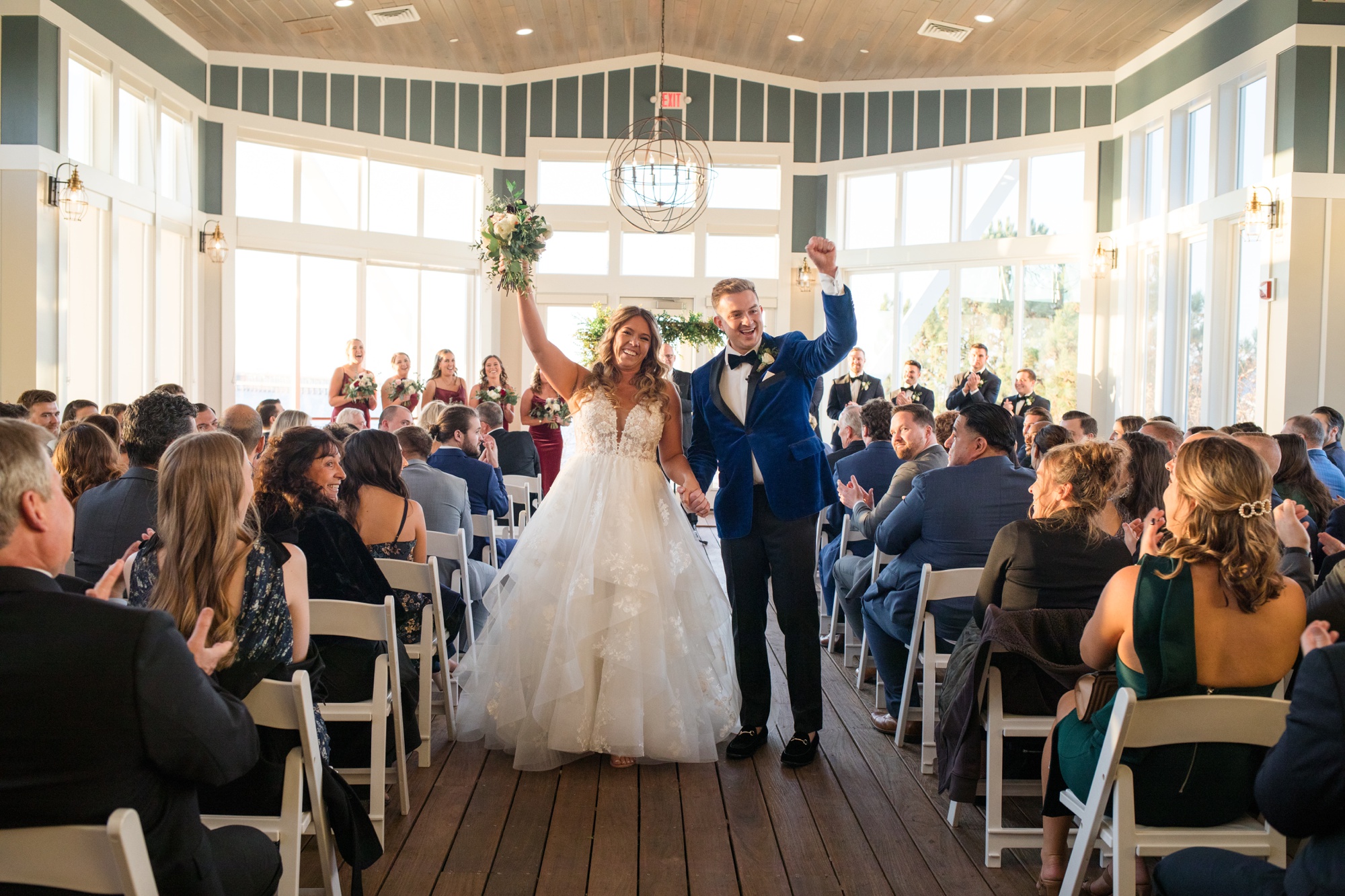 Chesapeake Bay Beach Club wedding ceremony in sunset ballroom