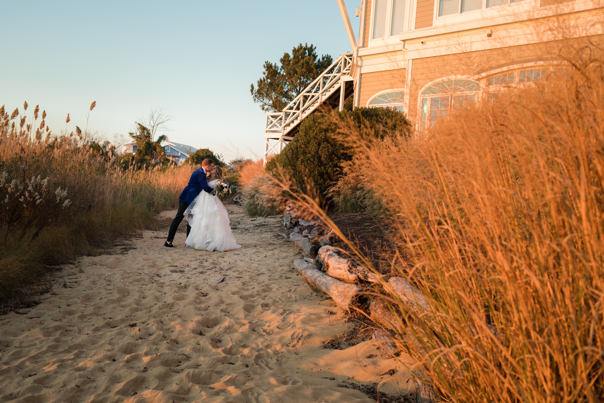 Chesapeake Bay Beach Club wedding couple photos at sunset beach