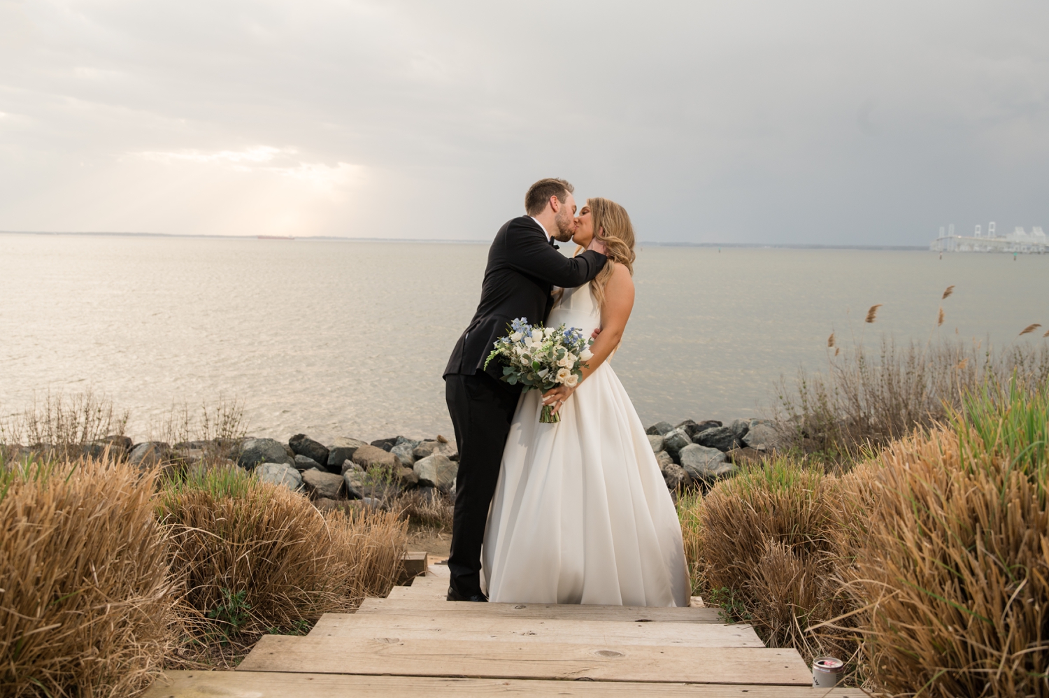 stormy sunset bay bridge wedding couple photo