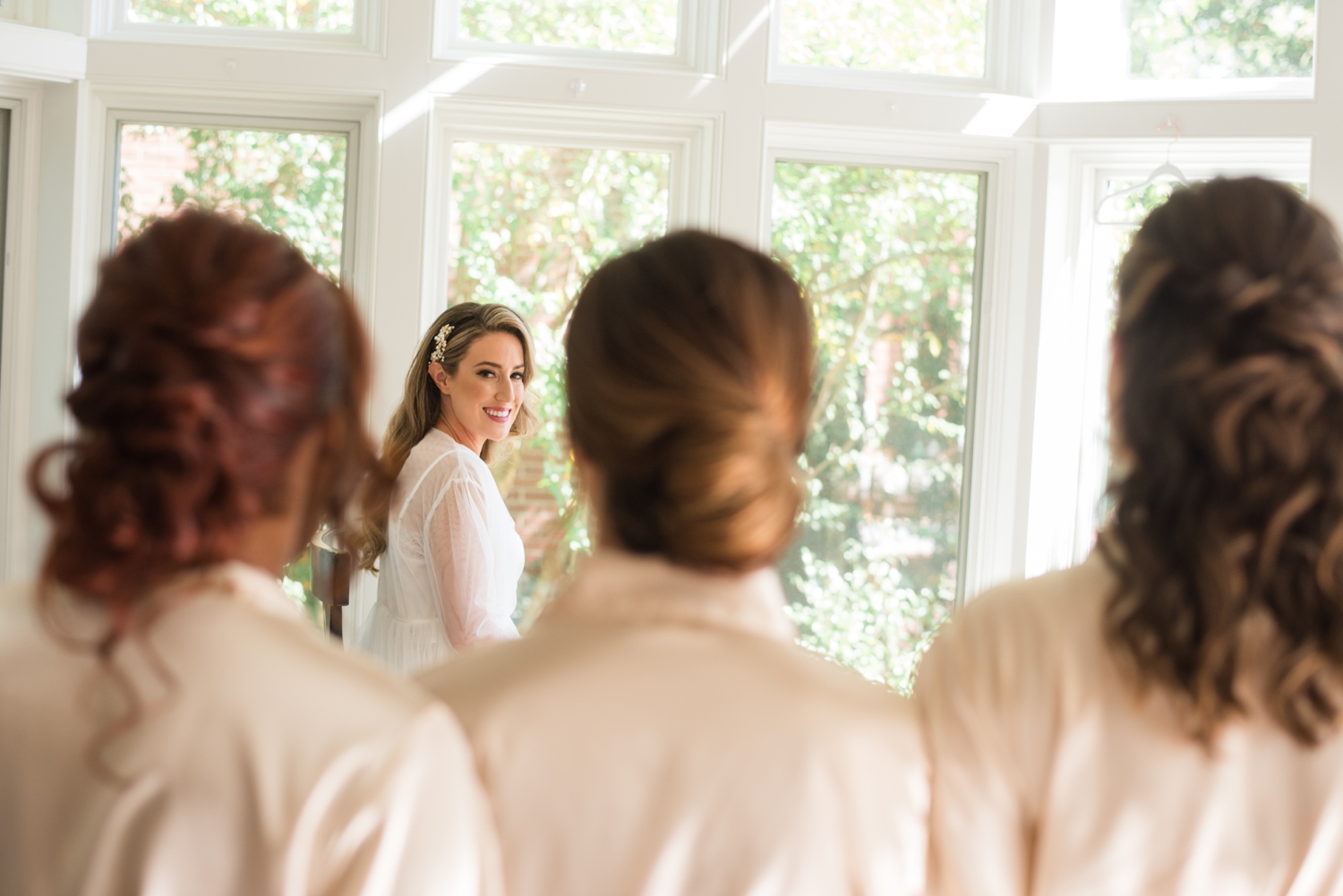 Chic The Tidewater House bride in the window