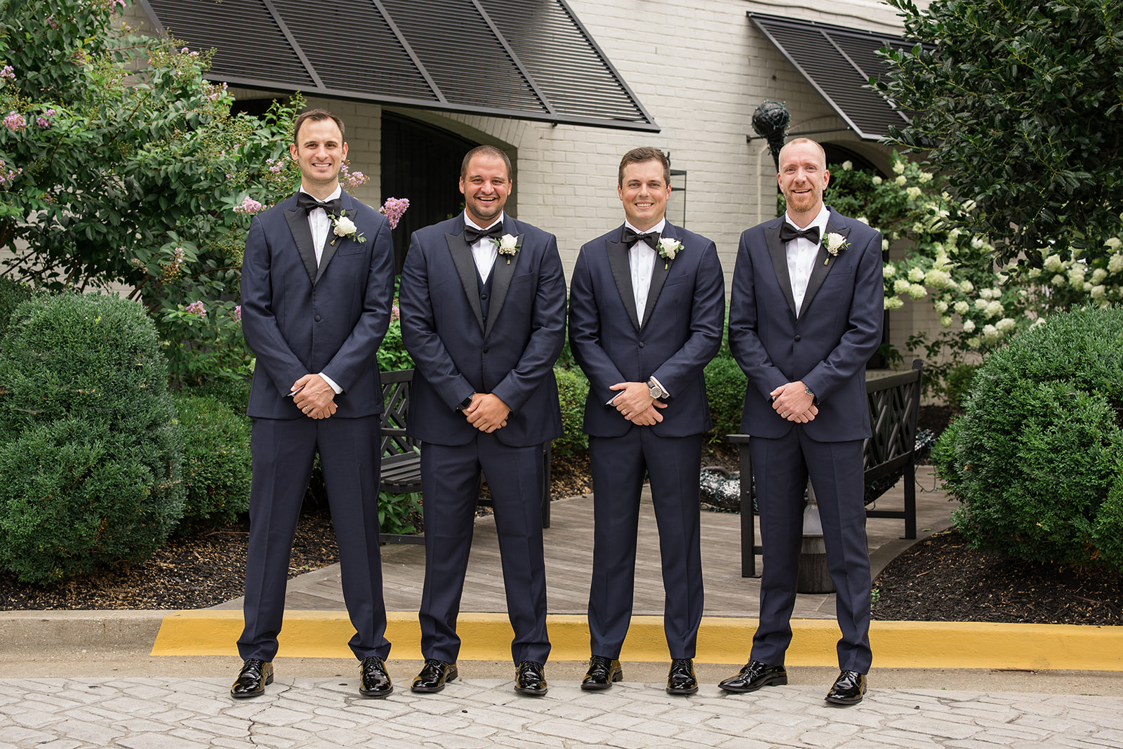 Groom and groomsmen portrait on the street