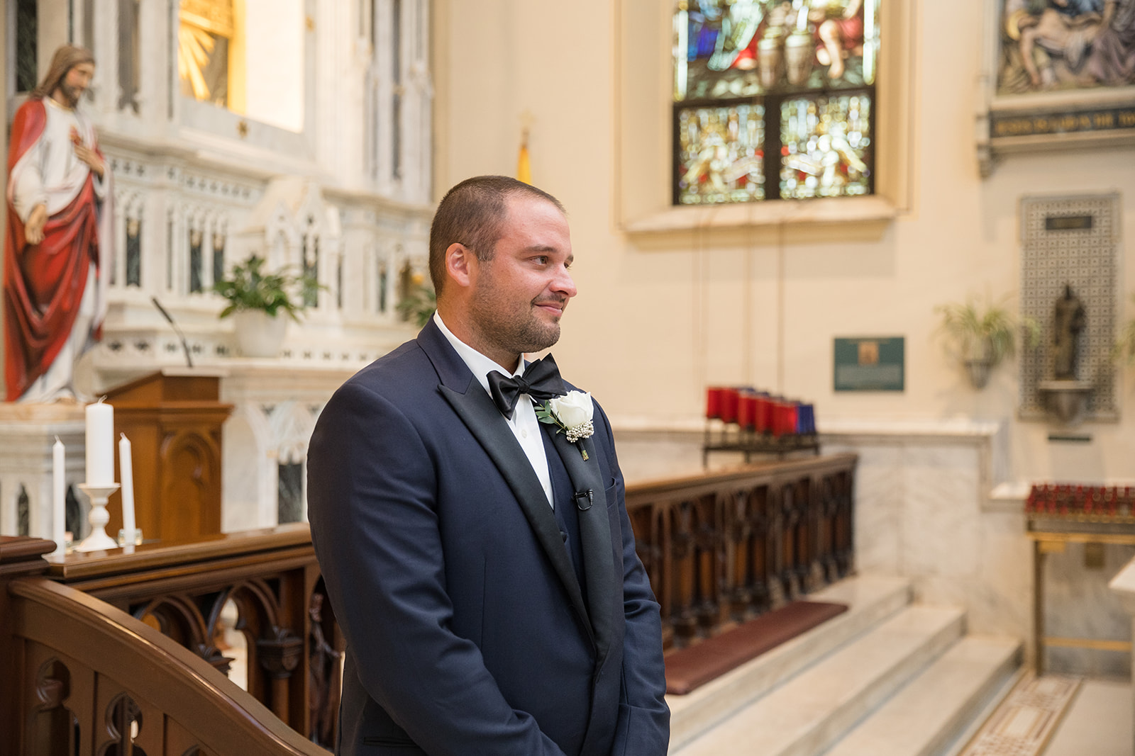 groom waiting at the altar for his bride