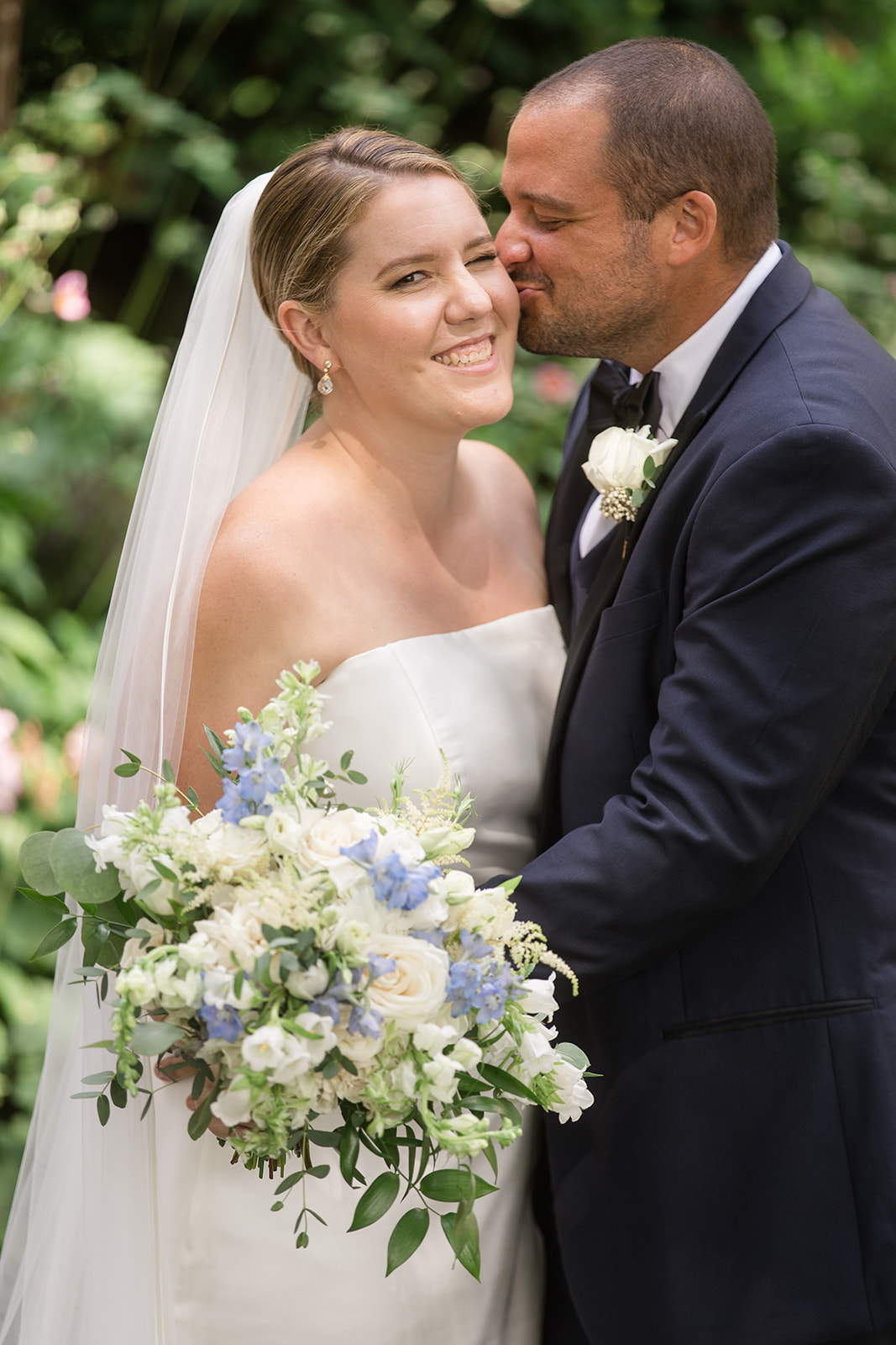 bride and groom portrait in garden