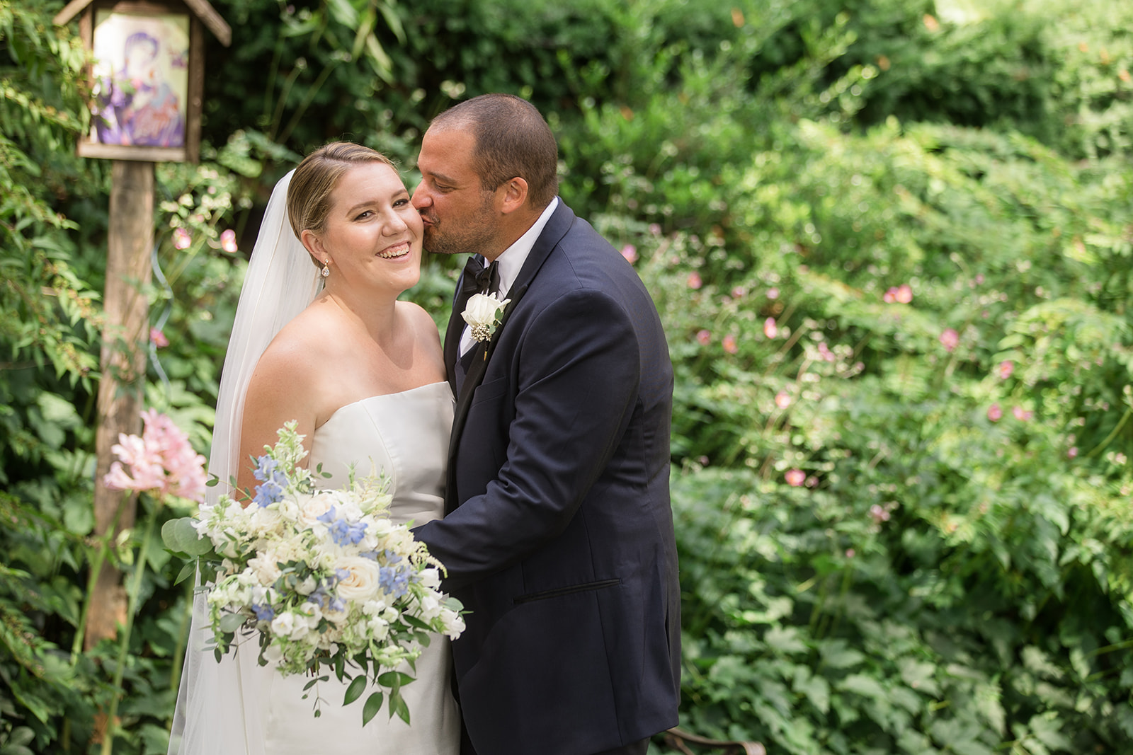 bride and groom portrait in garden