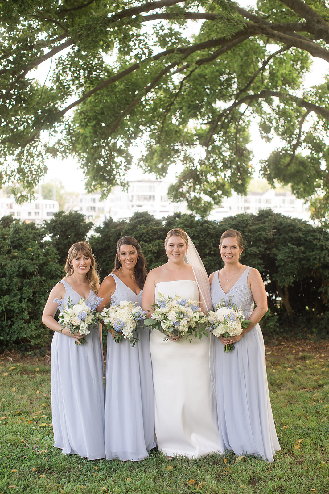 bride and bridesmaids portrait in garden