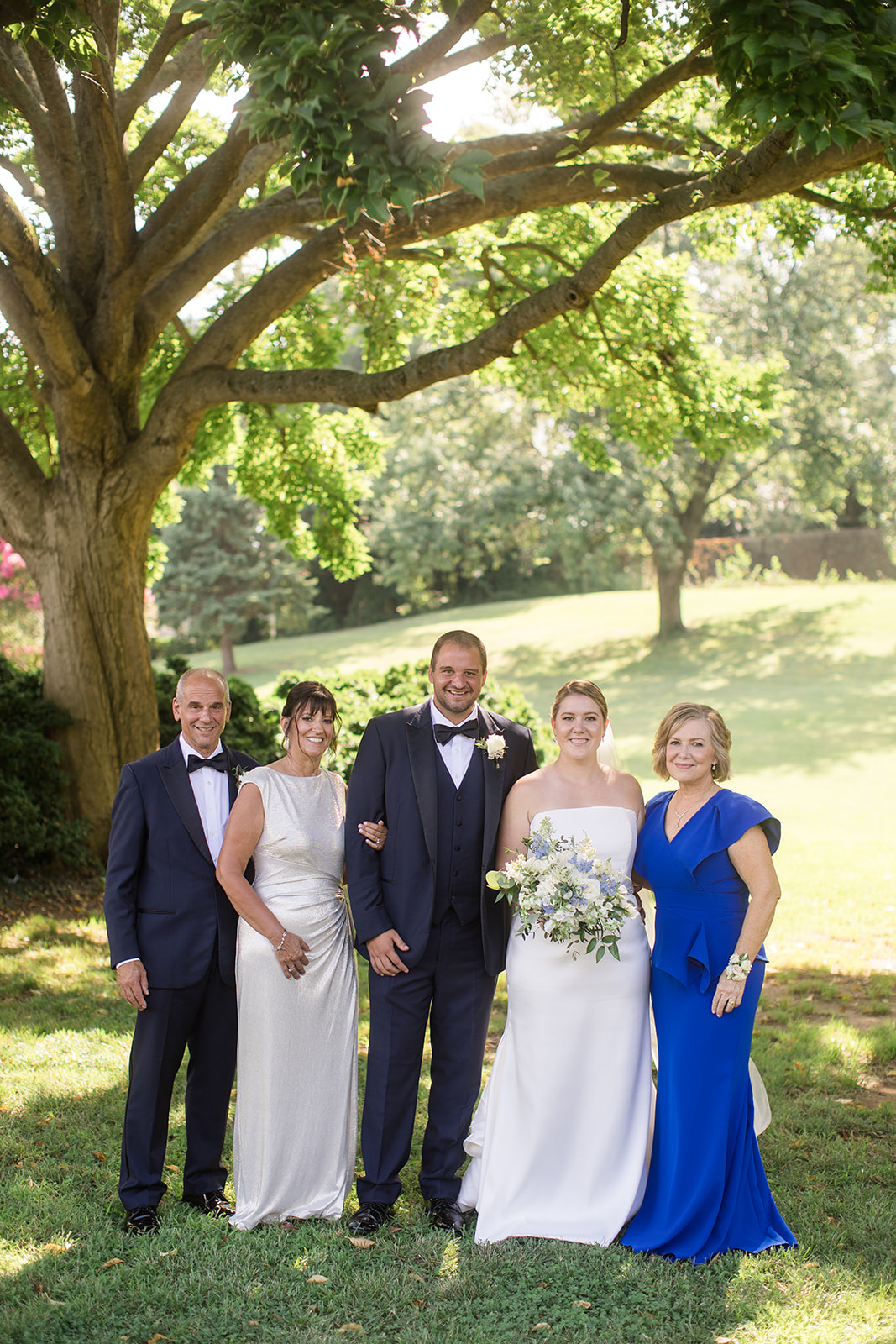 bride and groom with their parents