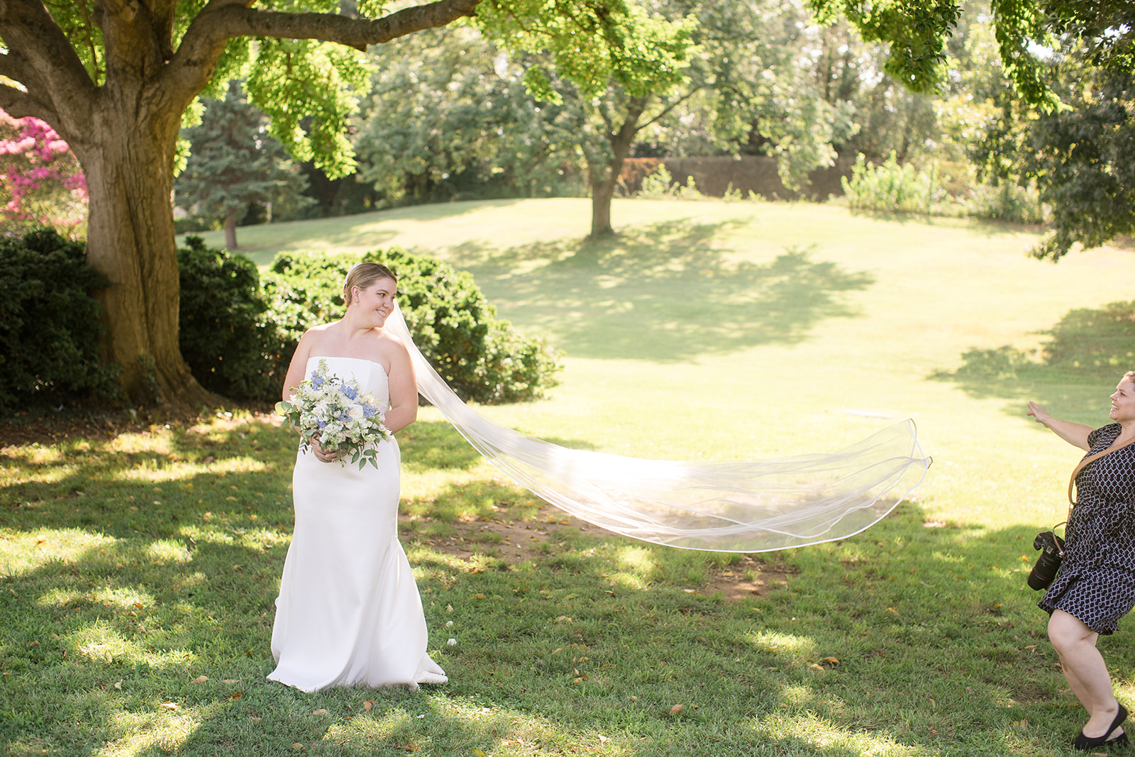 bride portrait veil flowing in the wind