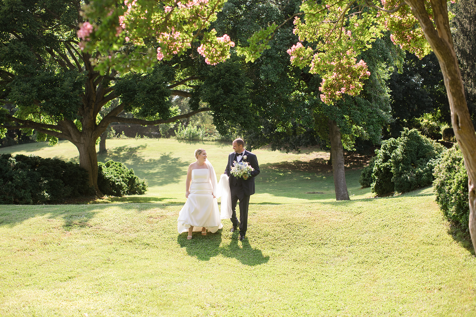 bride and groom portrait in grass