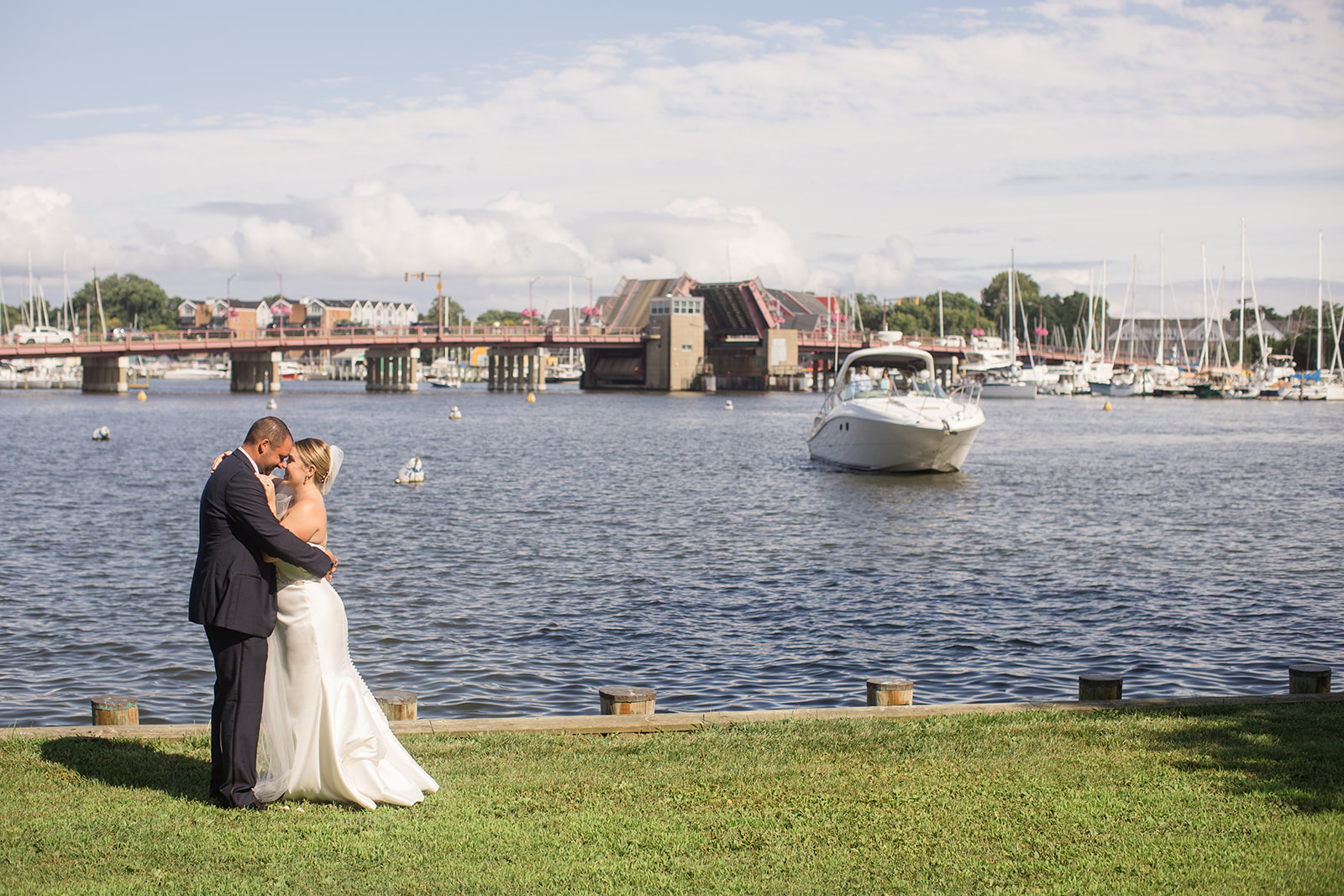 bride and groom portrait on the water