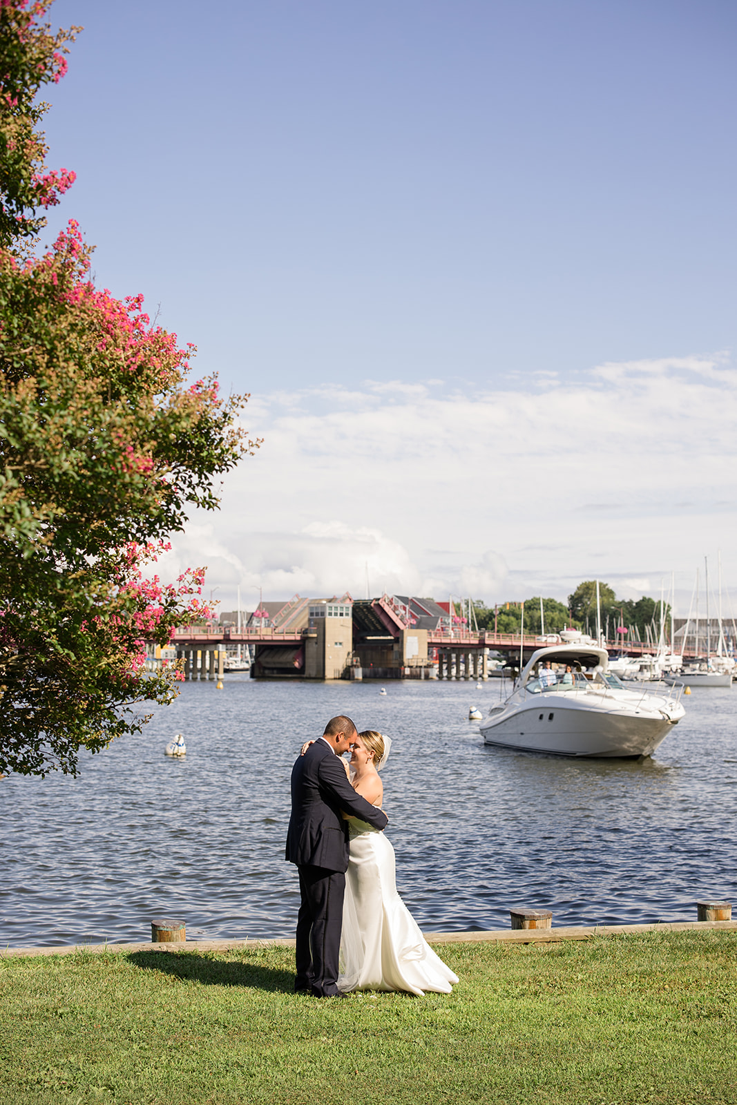 bride and groom portrait on the water