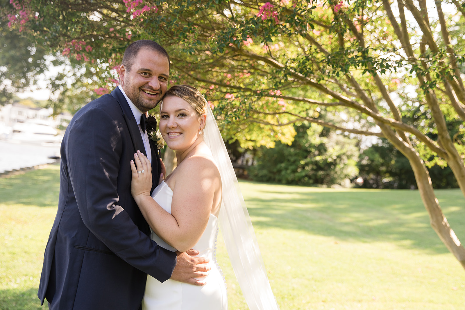 bride and groom portrait in grass