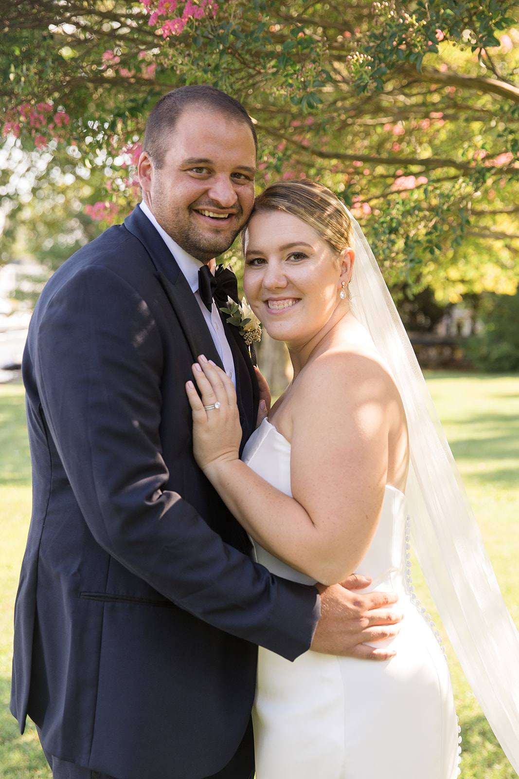 bride and groom portrait in grass