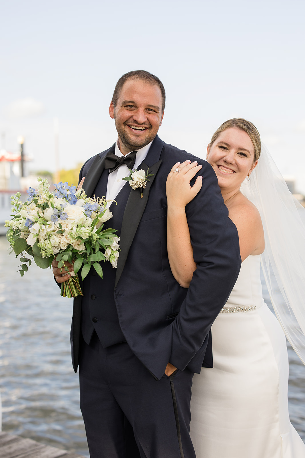 bride and groom portrait on annapolis docks