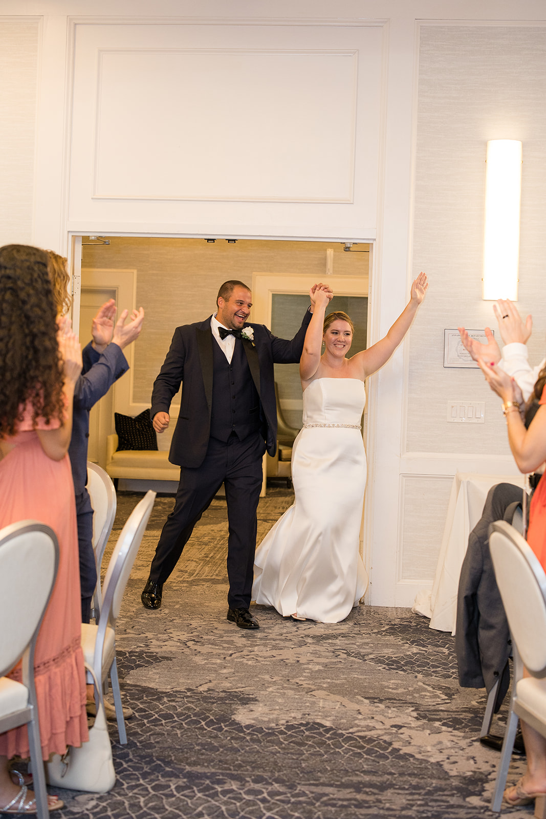 bride and groom enter reception