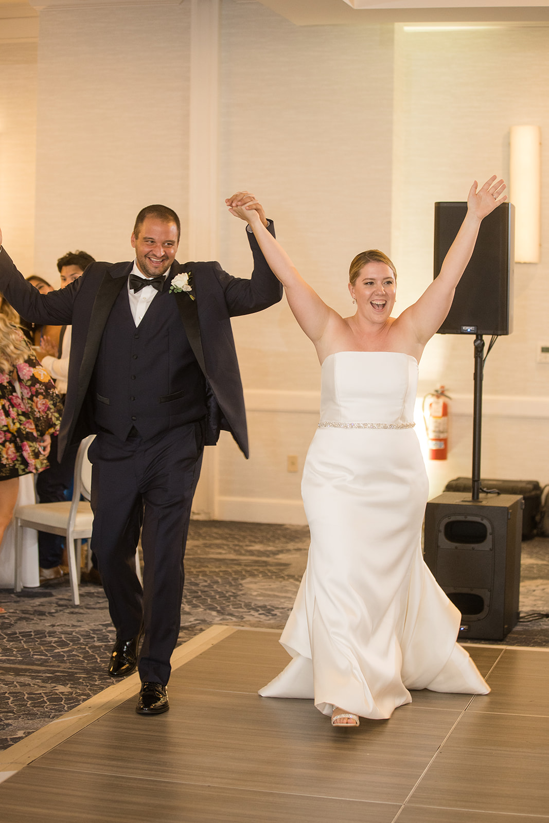 bride and groom enter reception