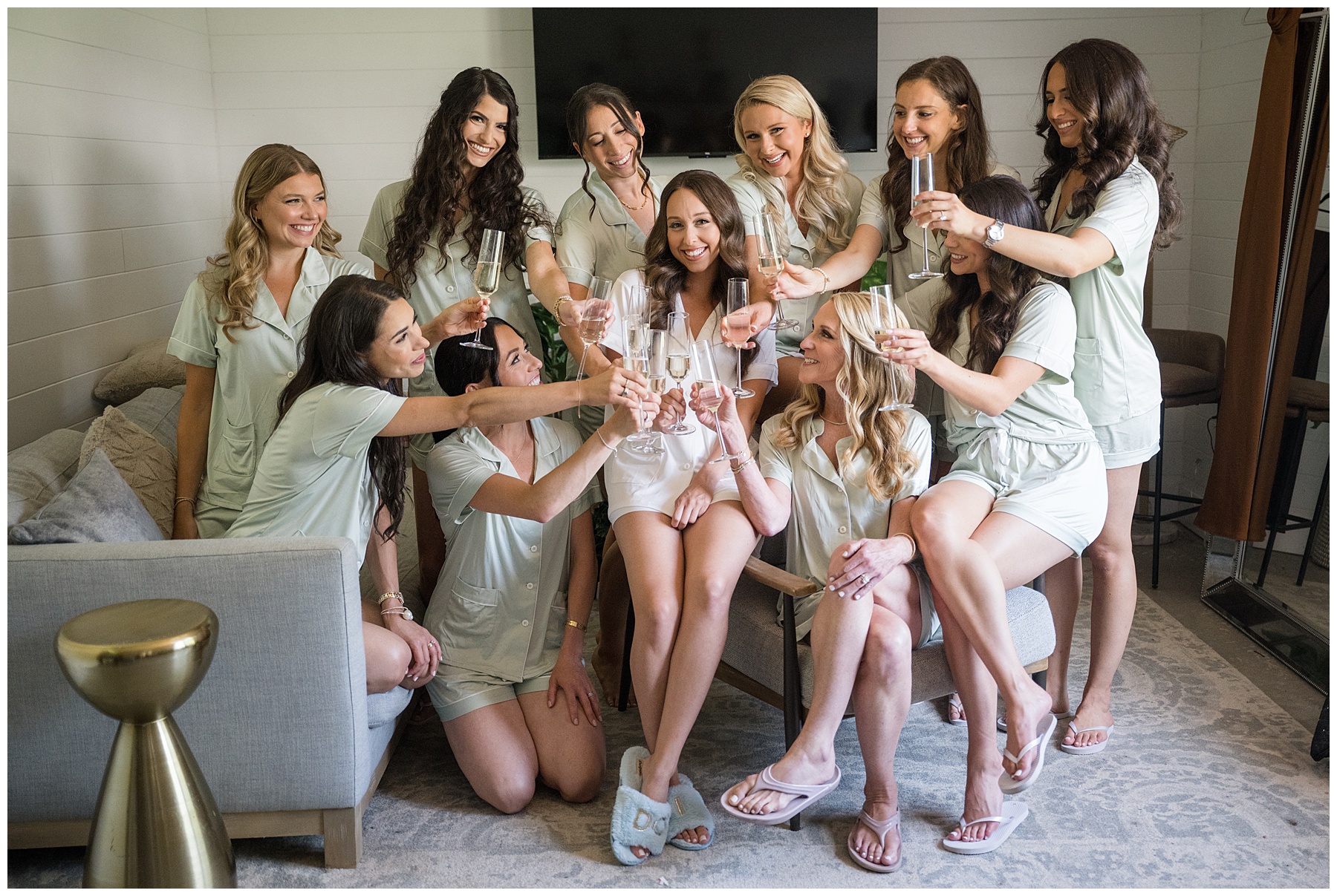 bride surrounded by bridesmaids in robes