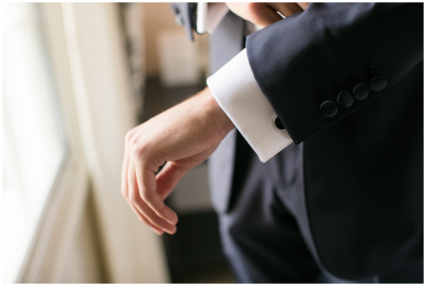 groom getting ready on wedding day