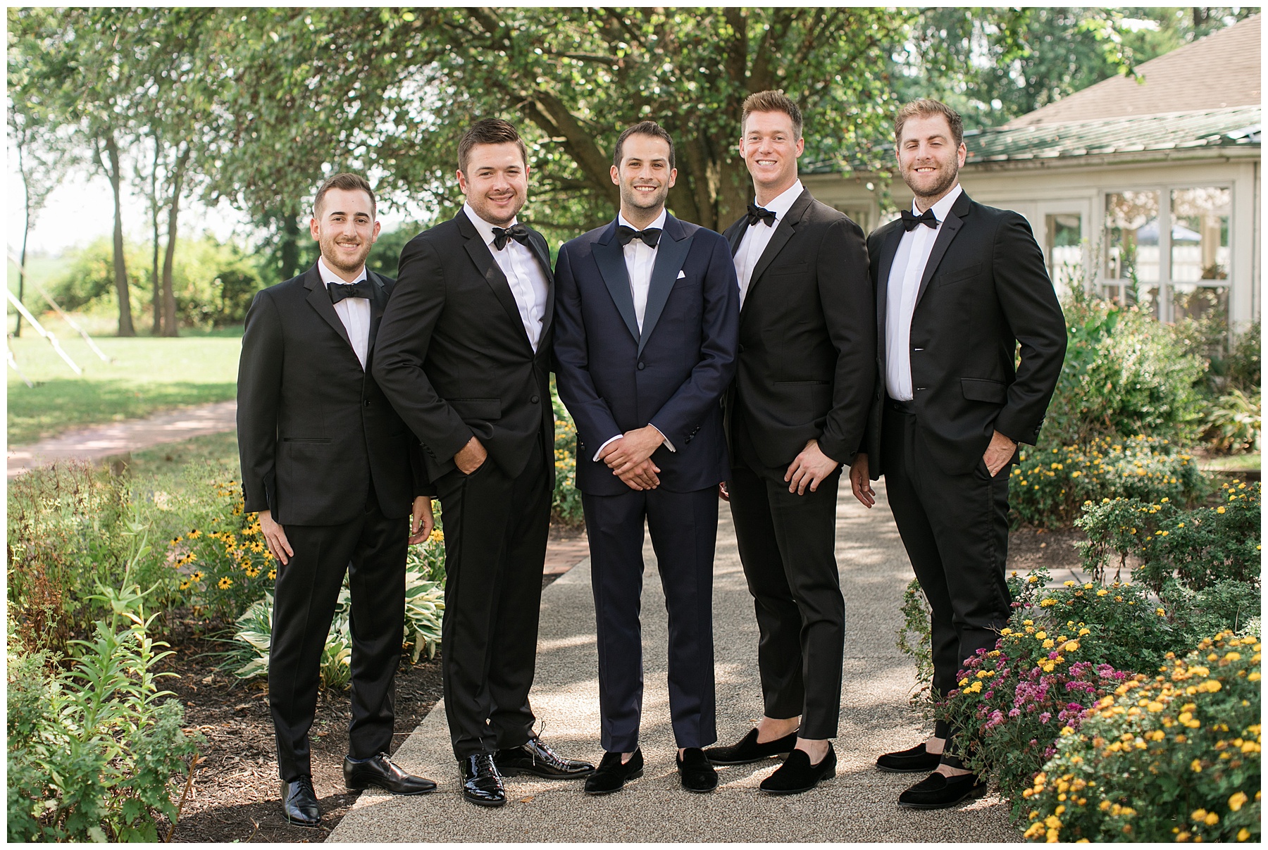 groomsmen group shot smiling