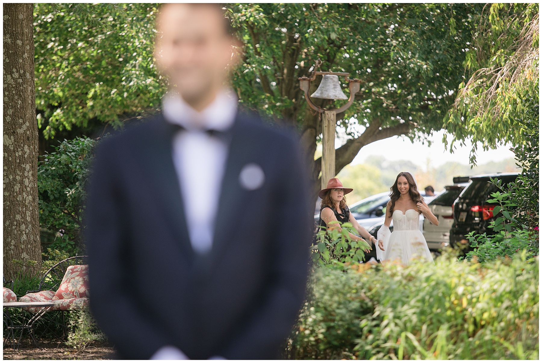 bride approaches for first look with groom