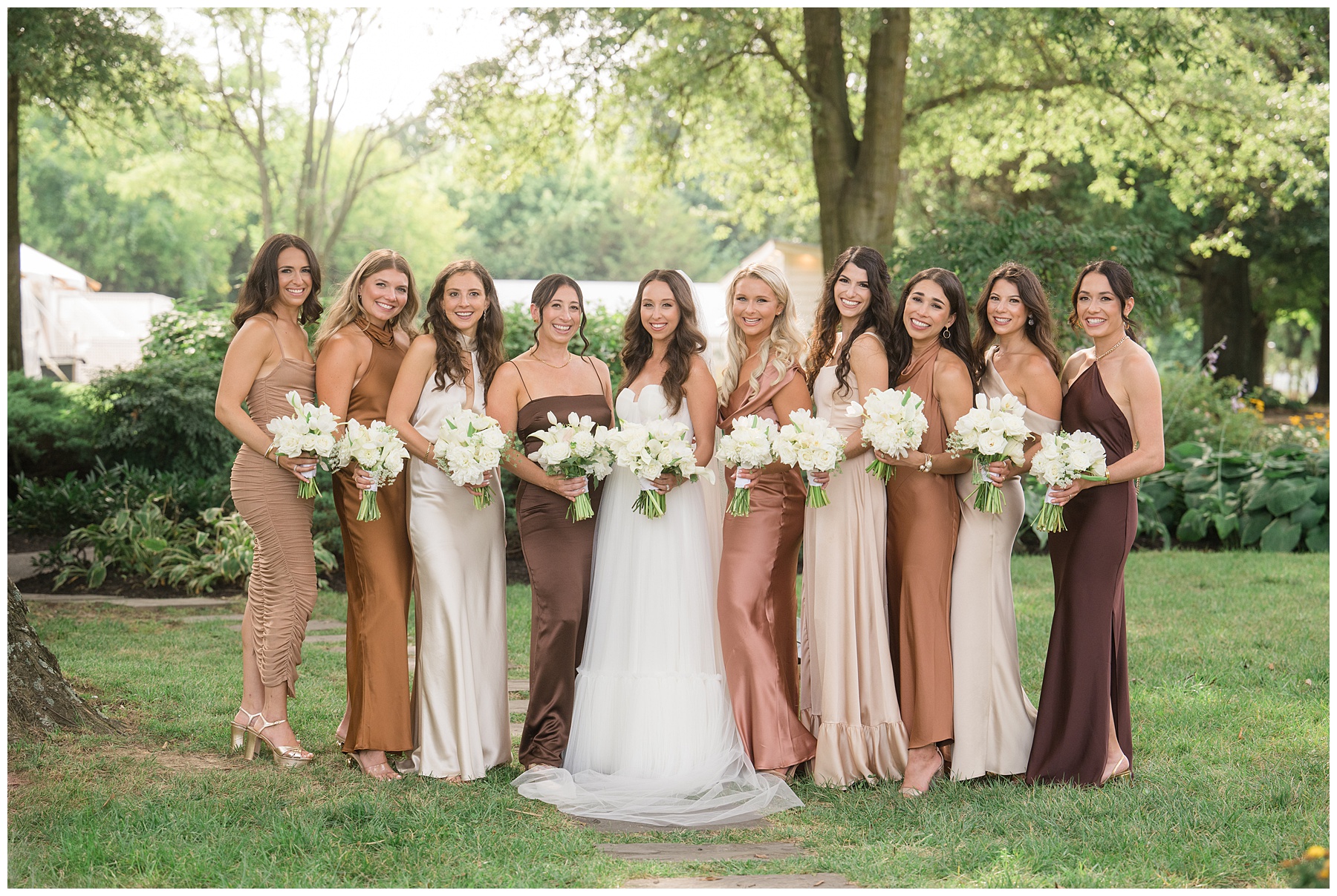 bride and bridesmaids smiling