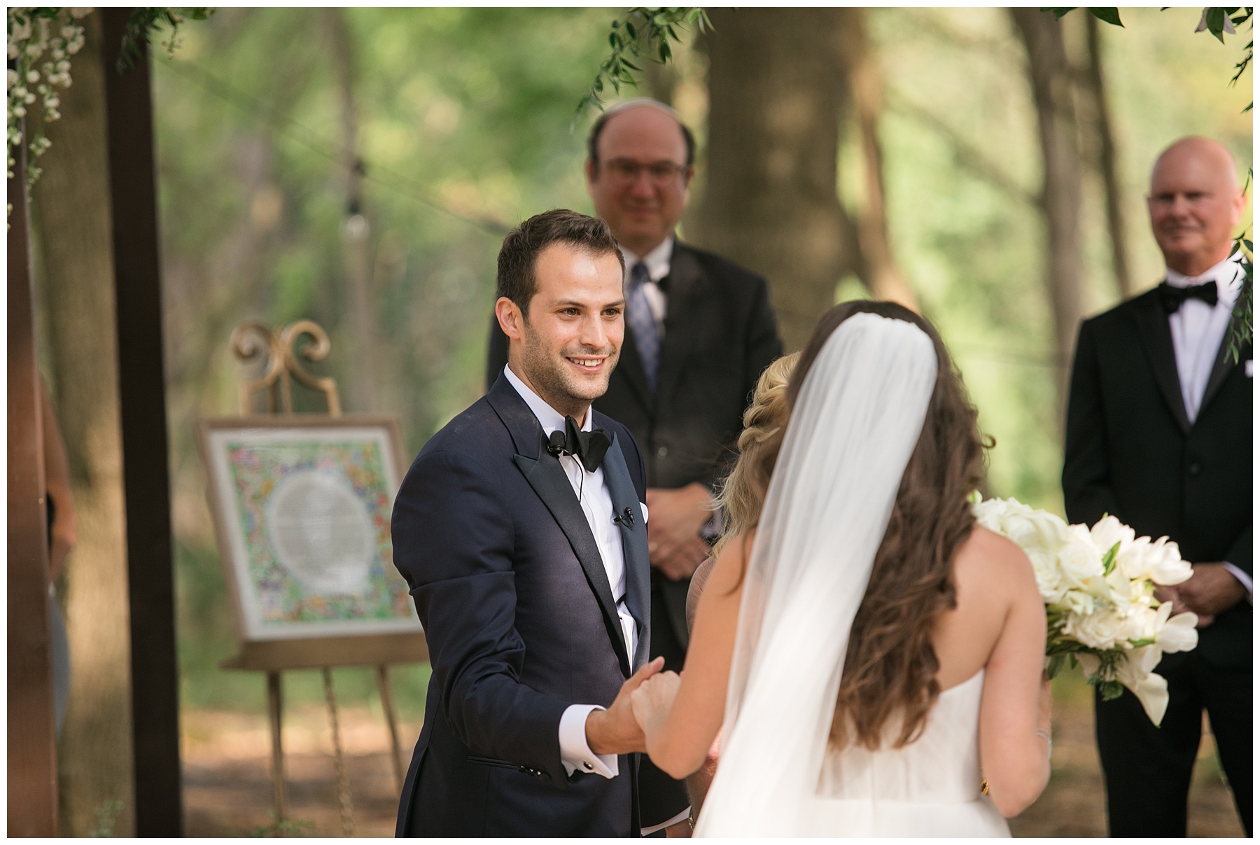 groom welcoming his bride to ceremony