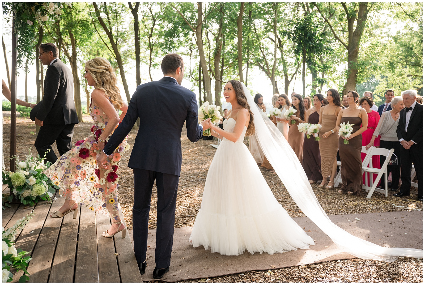 groom welcoming his bride to ceremony