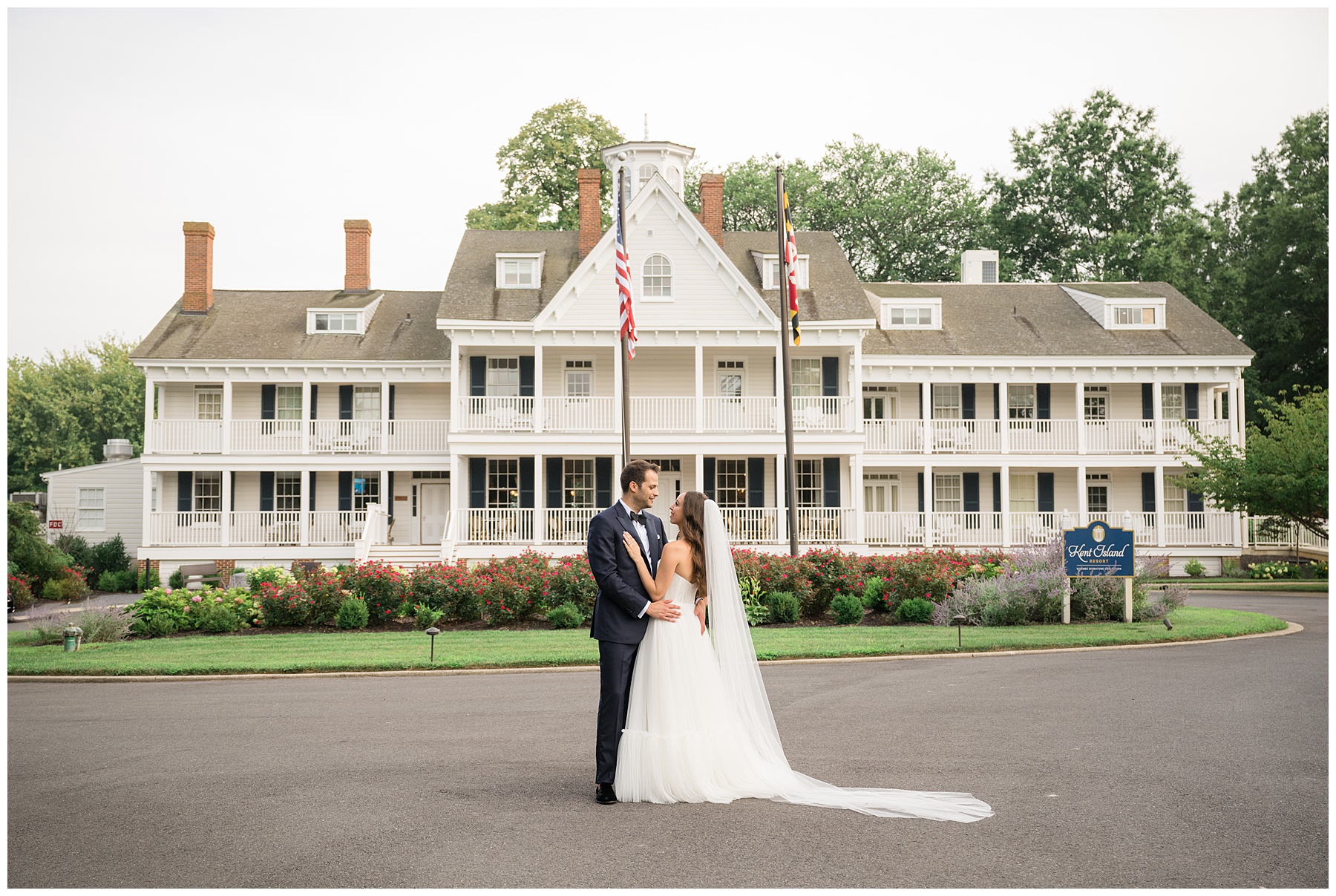 bride and groom in front of kent island resort