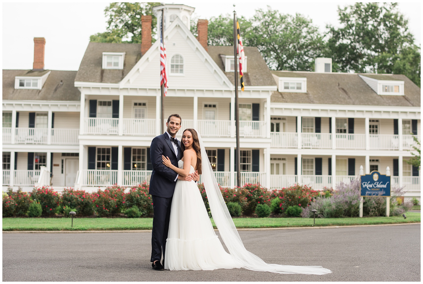 bride and groom in front of kent island resort