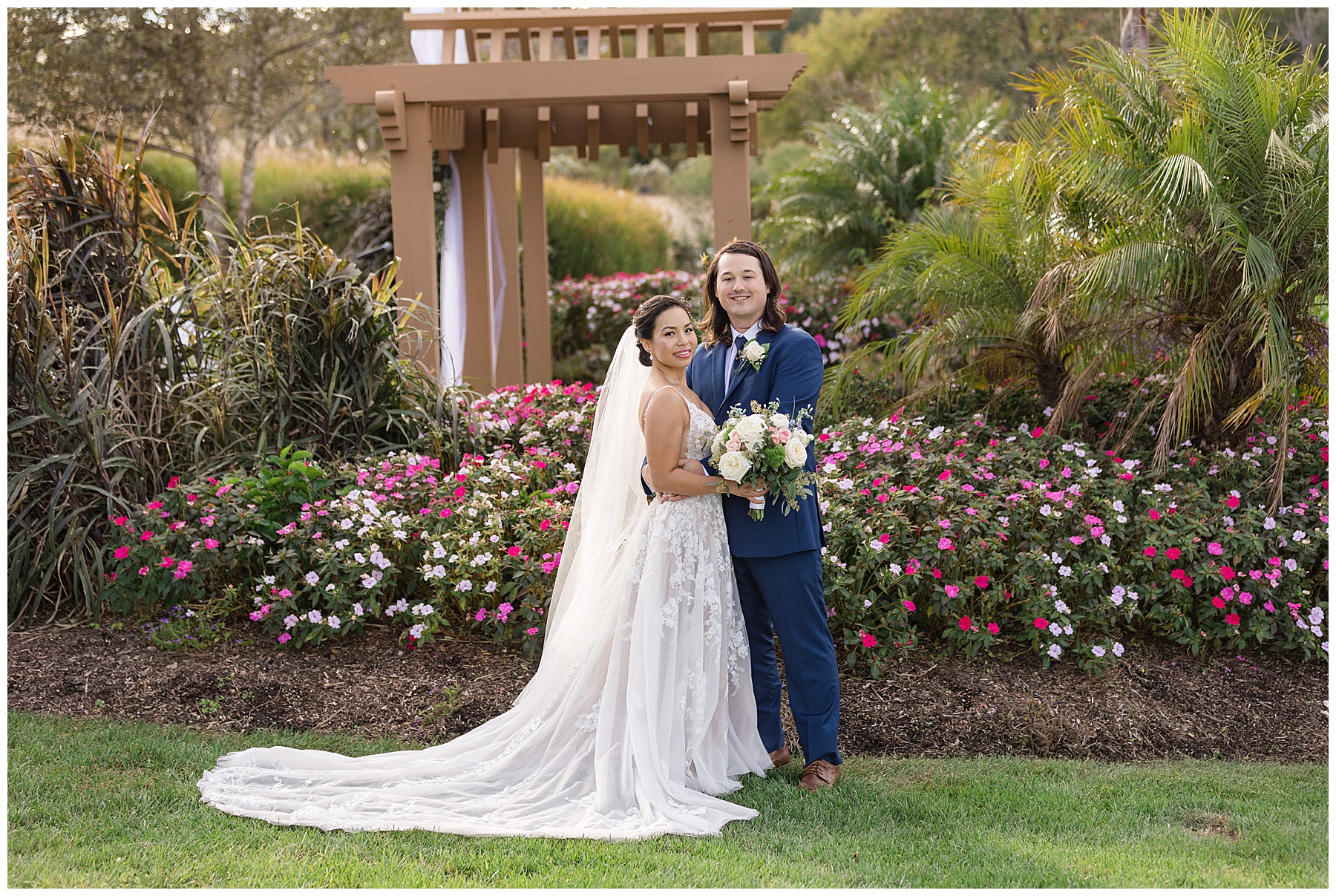 bride and groom at herrington on the bay smiling for camera