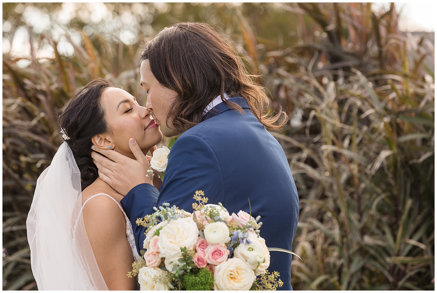 bride and groom kissing