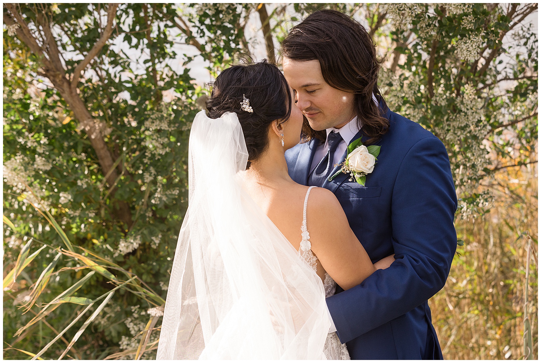 bride and groom embrace