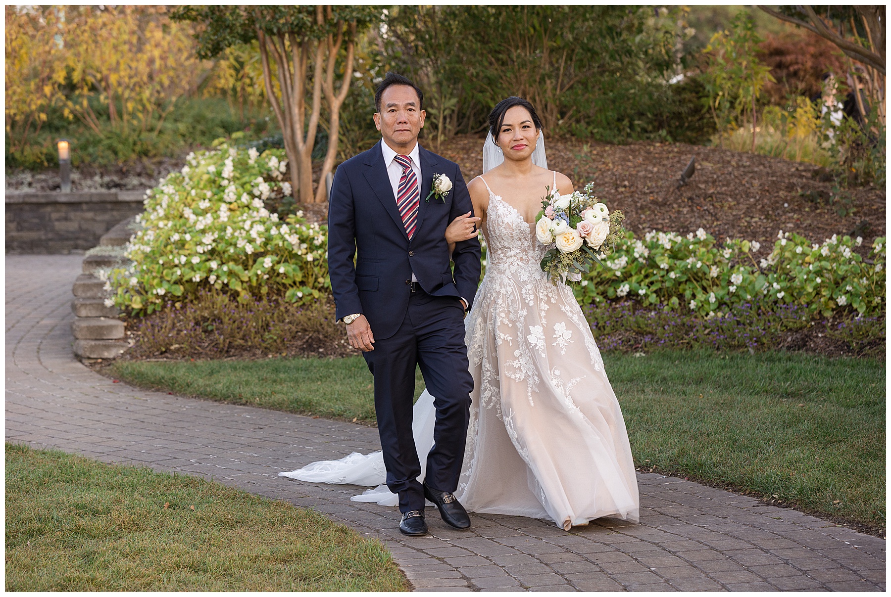 bride's dad walking her down the aisle