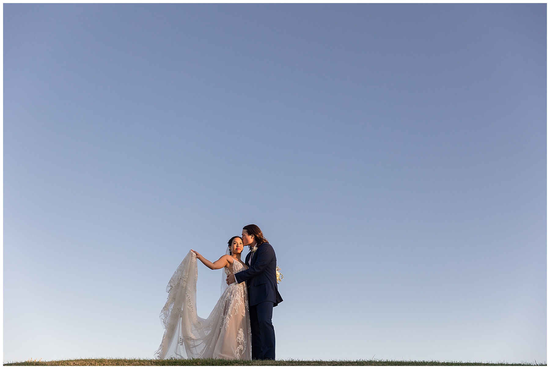 bride and groom sunset portrait