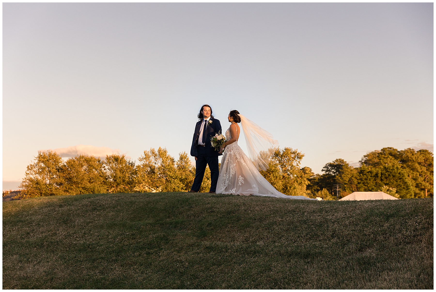 bride and groom sunset portrait