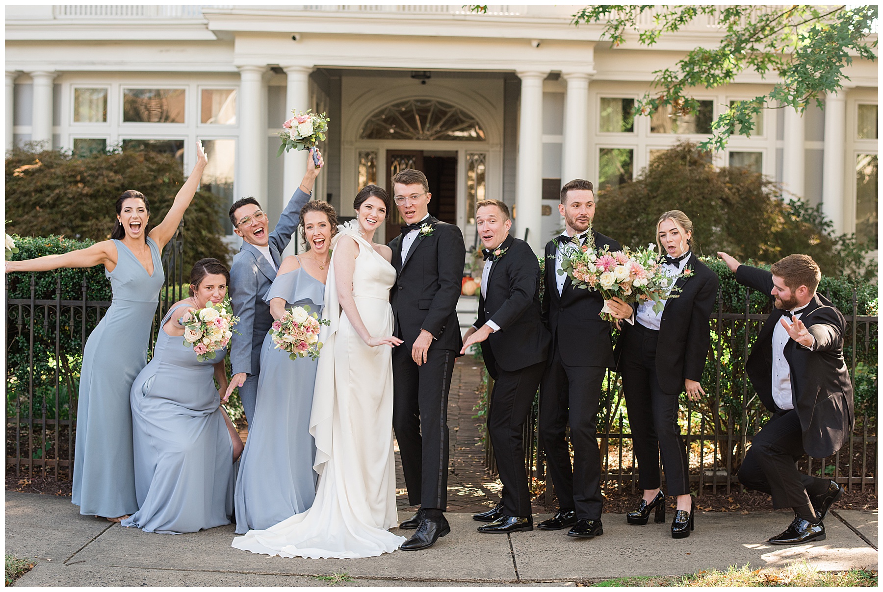 full wedding party portrait cheering