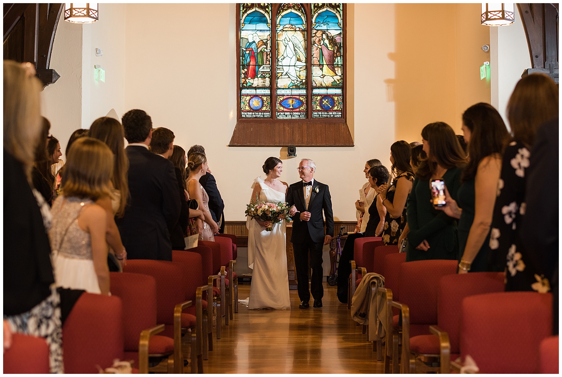 bride walking down aisle with dad