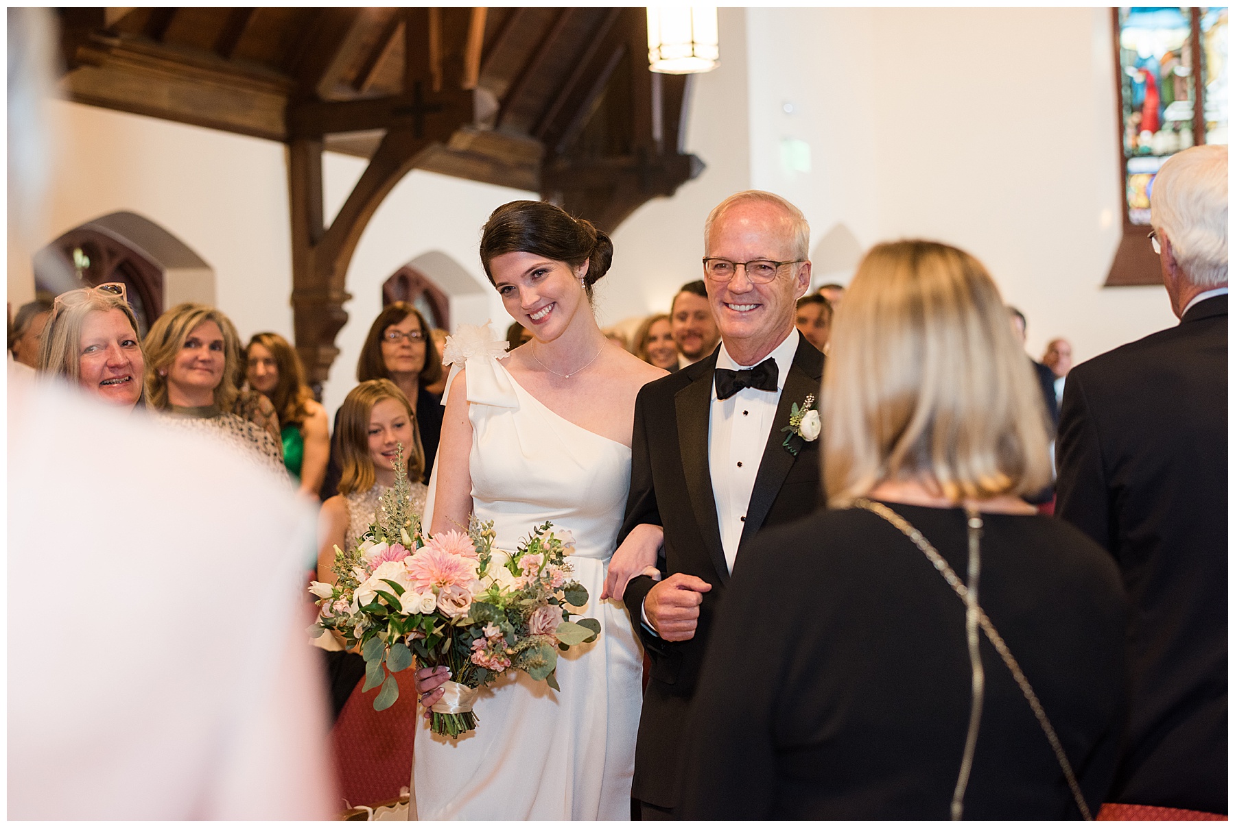 bride walking down aisle with dad