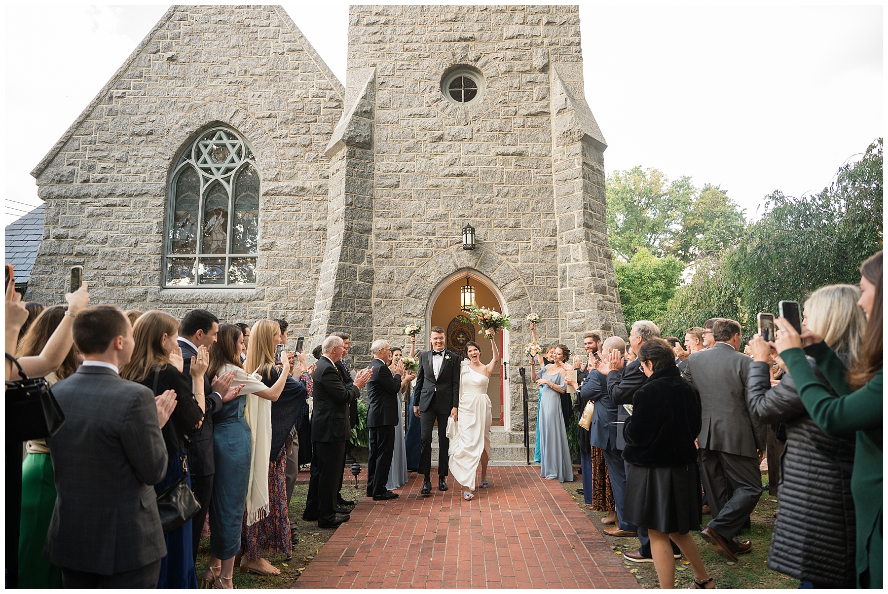 bride and groom celebrate with guests after ceremony