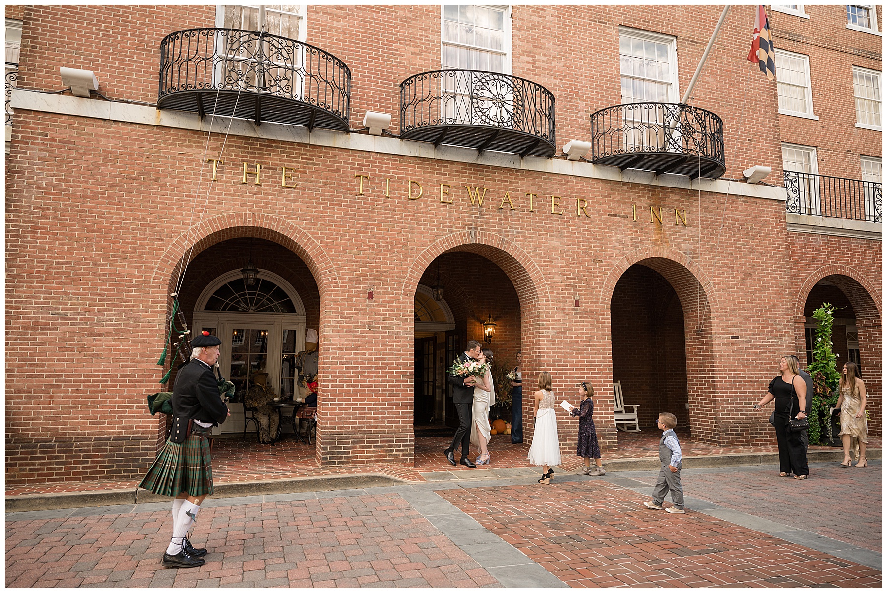 bride and groom leading guests to reception