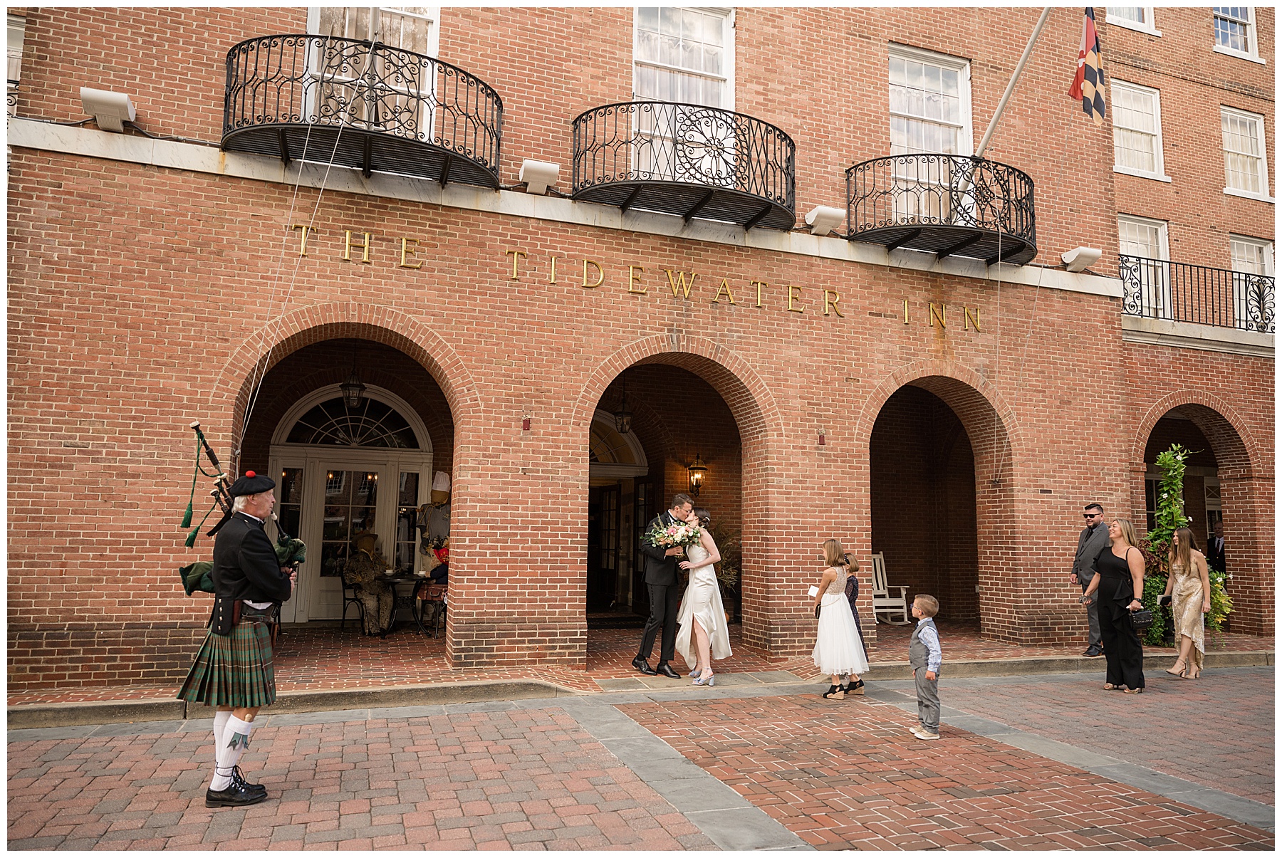 bride and groom leading guests to reception