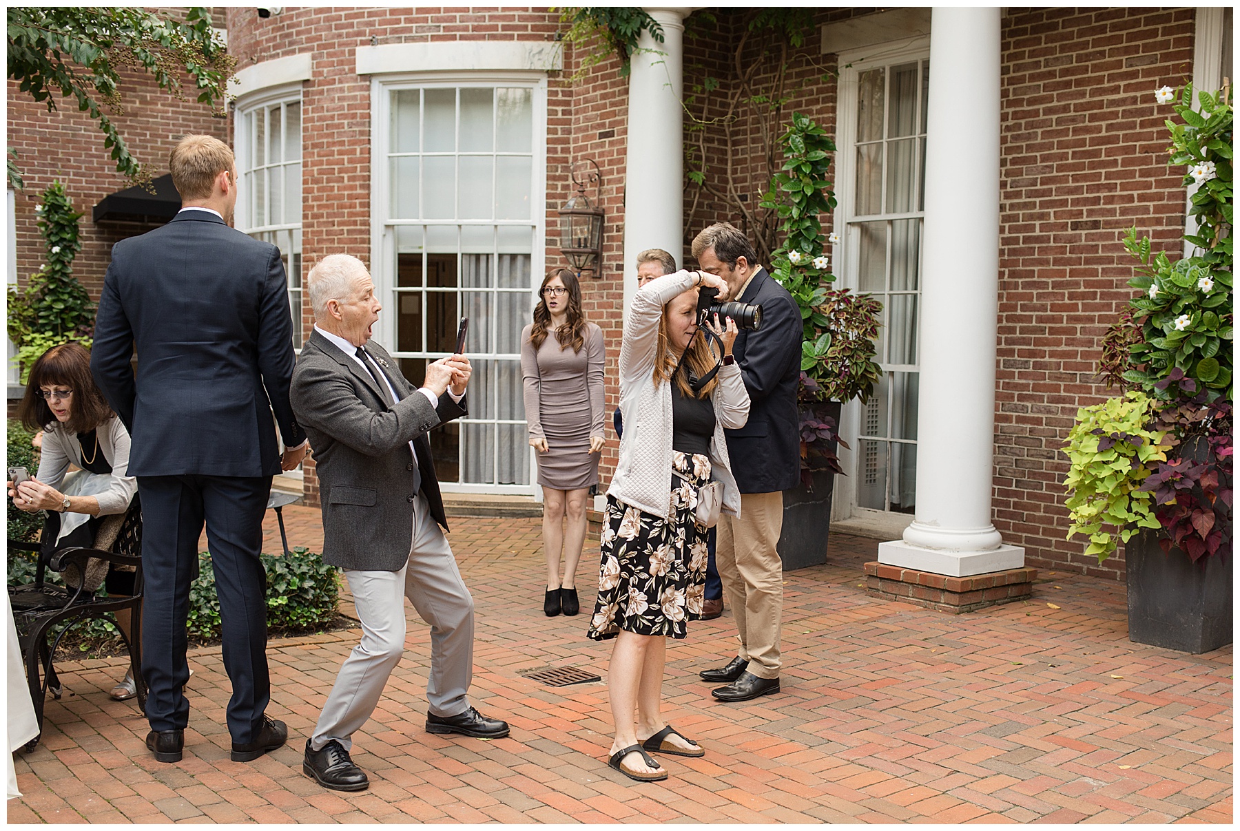 candid guests and photographer