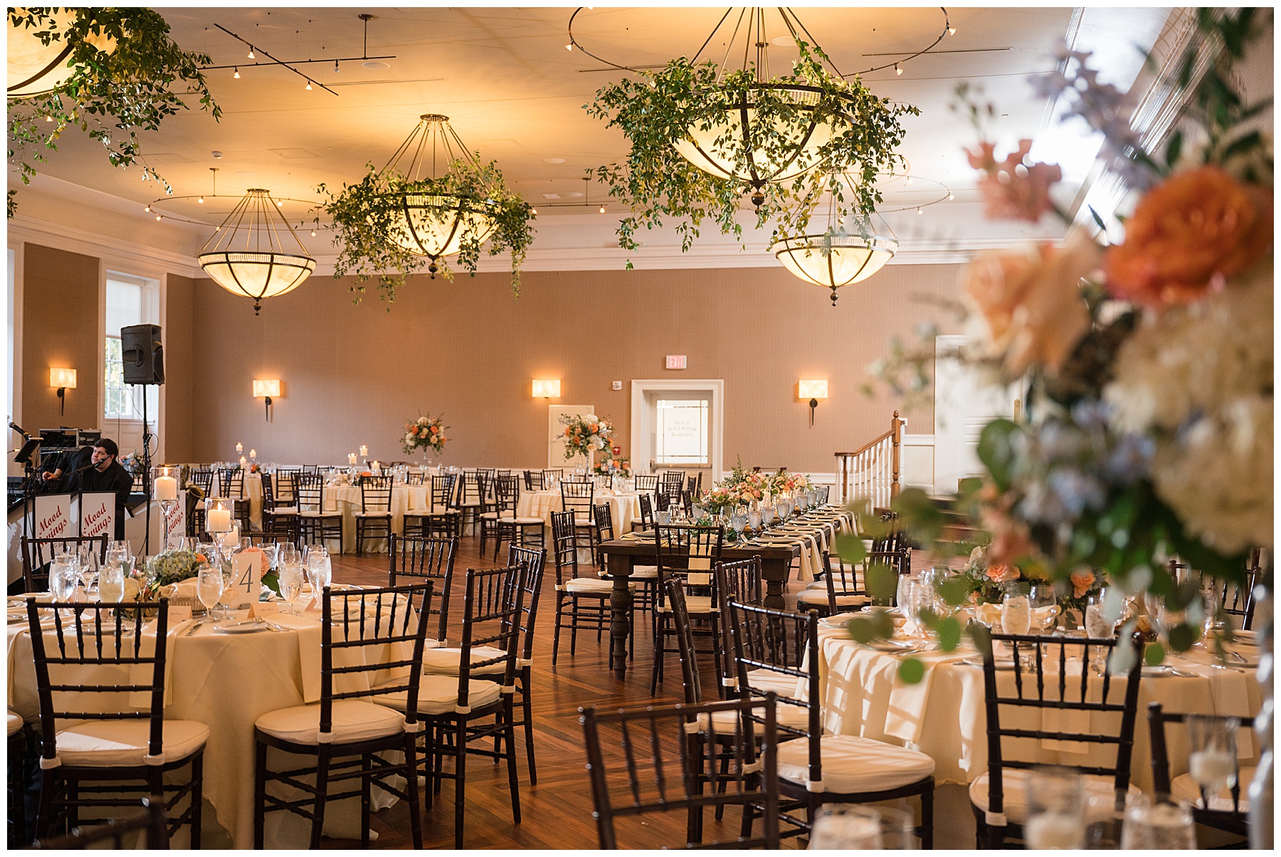 tidewater inn reception details greenery chandeliers