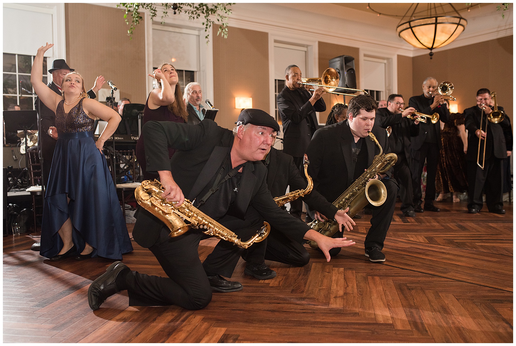 guests candid dancing band brass mood swings